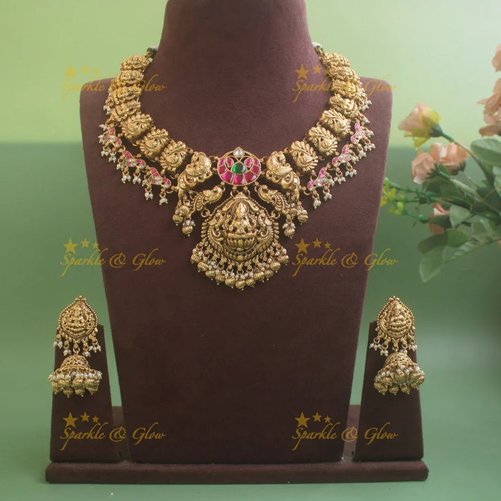 Elegant Lakshmi peacock carved jadau short necklace with pearls and gold beads - pink - Sparkle and Glow