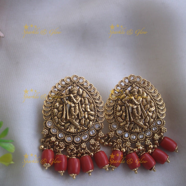 Gorgeous Krishna playing flute and peacock carved haram with multi layer gold and red beads chain - Sparkle and Glow - Back Thread - 