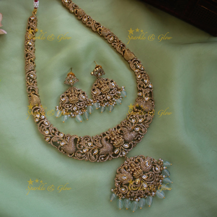Grand intricate Lakshmi peacock carved victorian AD long necklace with mint green beads