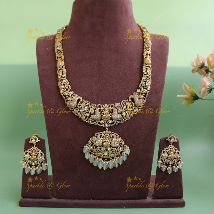 Grand intricate Lakshmi peacock carved victorian AD long necklace with mint green beads