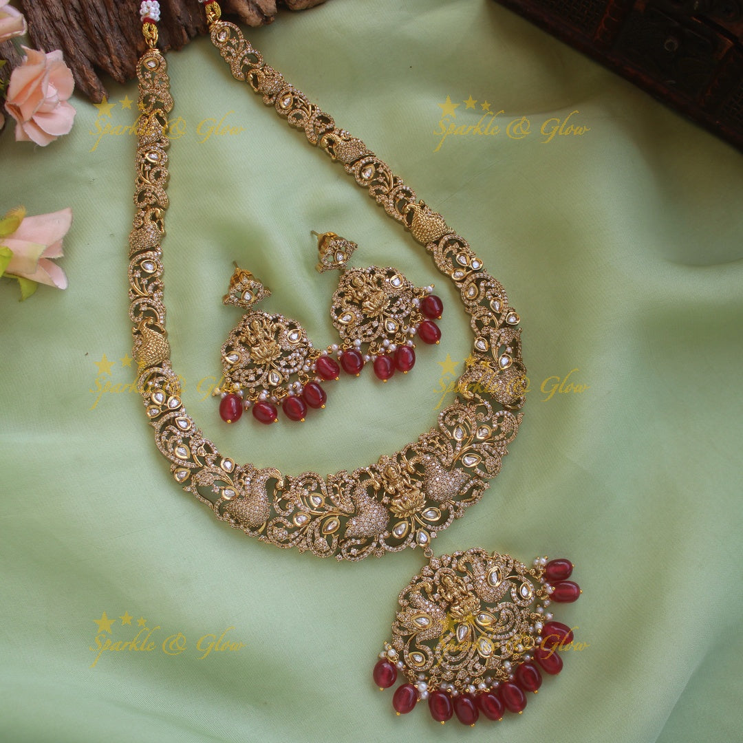 Grand intricate Lakshmi peacock carved victorian AD long necklace with red beads