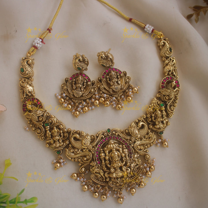 Stunning Lakshmi peacock carved jadau short necklace with ruby emerald stones and gold beads