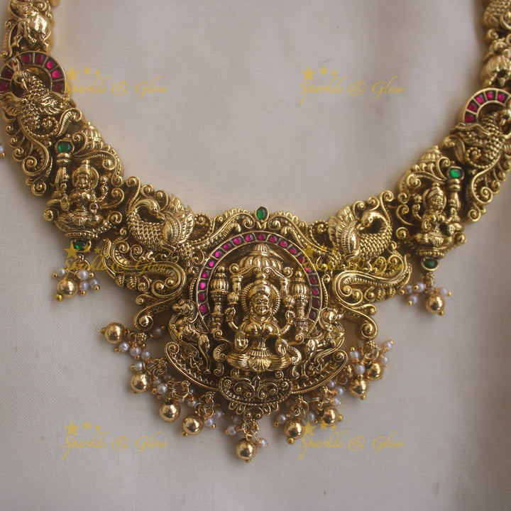 Stunning Lakshmi peacock carved jadau short necklace with ruby emerald stones and gold beads