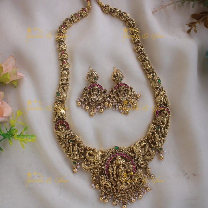 Grand intricate Lakshmi peacock carved jadau long necklace with ruby emerald stones and gold beads