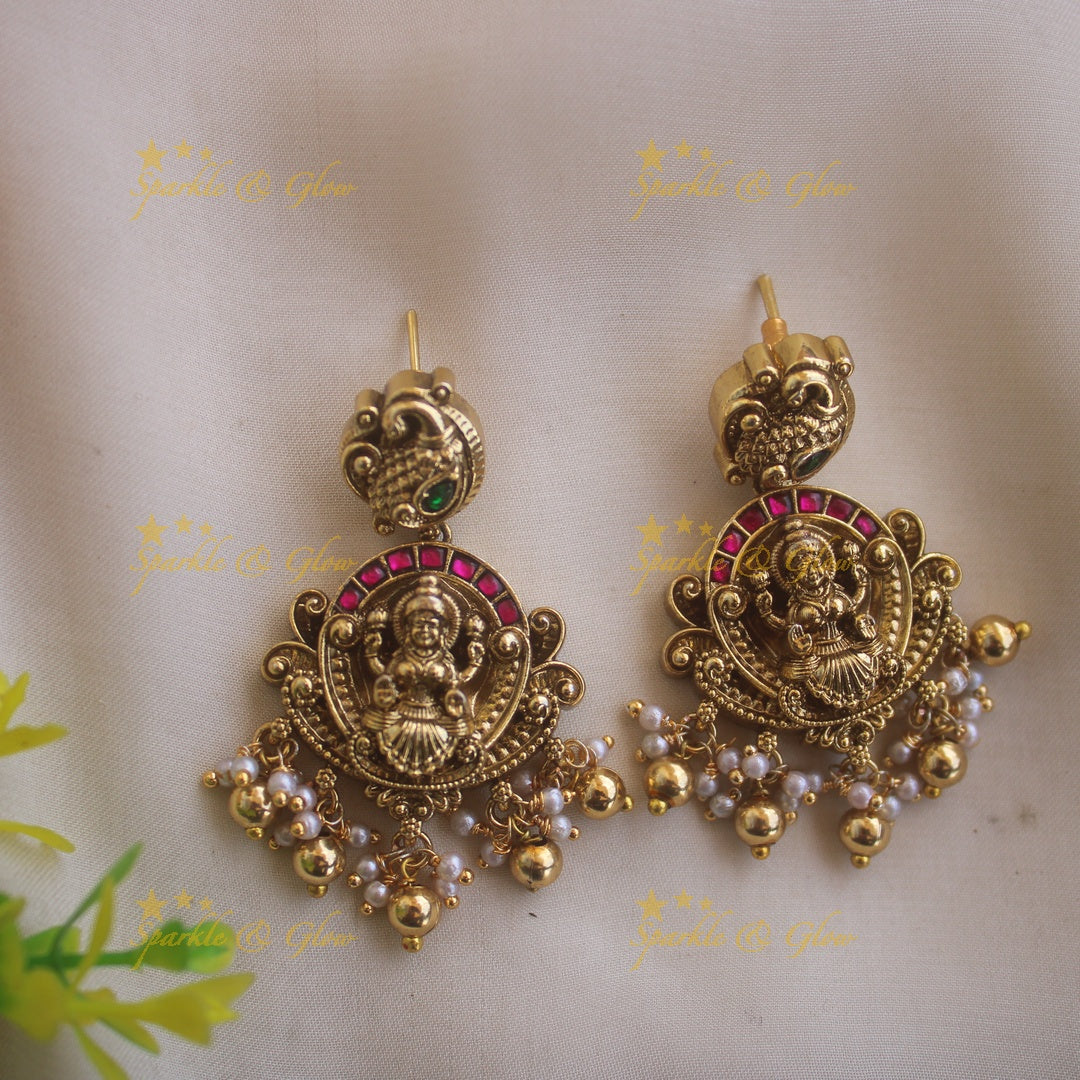 Grand intricate Lakshmi peacock carved jadau long necklace with ruby emerald stones and gold beads