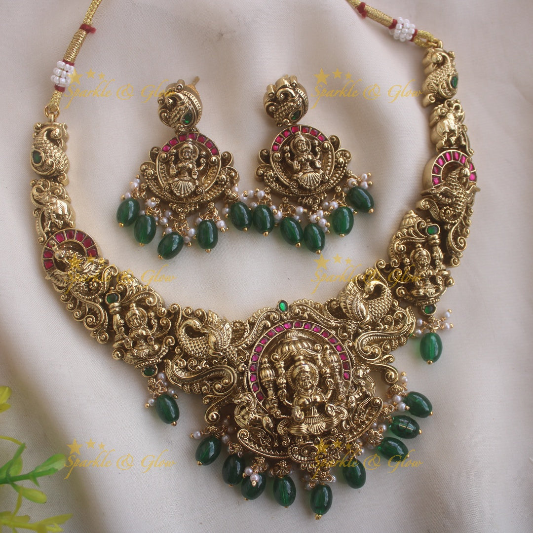 Beautiful Lakshmi peacock carved short necklace with kemp stones and green beads