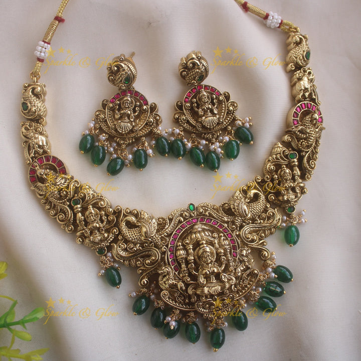 Beautiful Lakshmi peacock carved short necklace with kemp stones and green beads