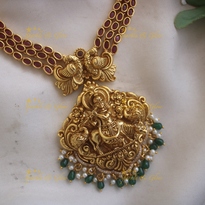 Exclusive Krishna playing flute and peacock carved layer long necklace with ruby stone pearls and green beads