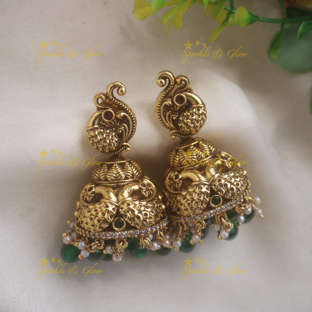 Stunning Lakshmi Peacock carved long necklace with CZ stones and green beads