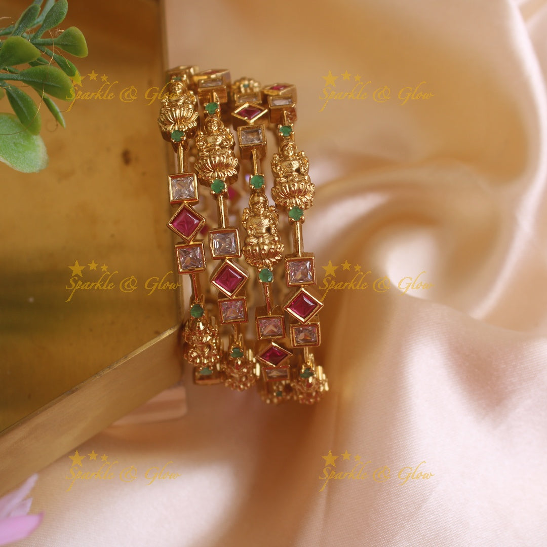 Beautiful Lakshmi carved bangles with ruby emerald and white stones, two pairs , 2.4