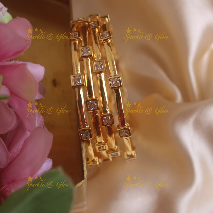 Gold alike Square stone bangles with ruby and emerald, two pairs ,