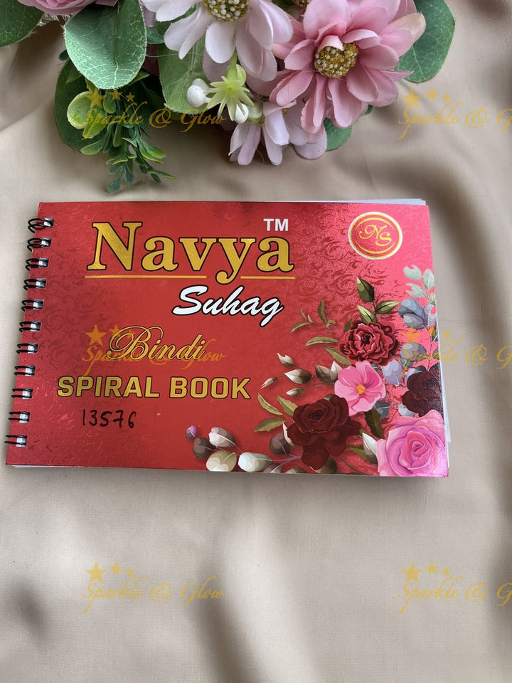 Navya round shape stone silver and gold design bindi with different size in spiral book in assorted colours