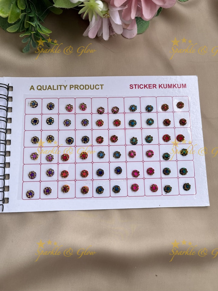 Navya round 3D design stone bindi with different size in spiral book in assorted colours