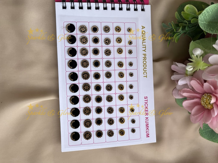 Navya stone silver and gold design black bindi with different shape and size in spiral book