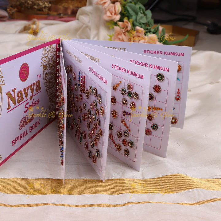 Navya stone silver and gold design bindi with different shape and size in spiral book in assorted colours
