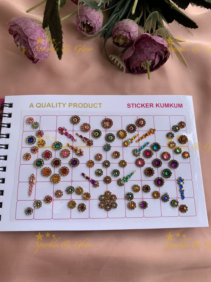 Navya stone silver and gold design bindi with different shape and size in spiral book in assorted colours