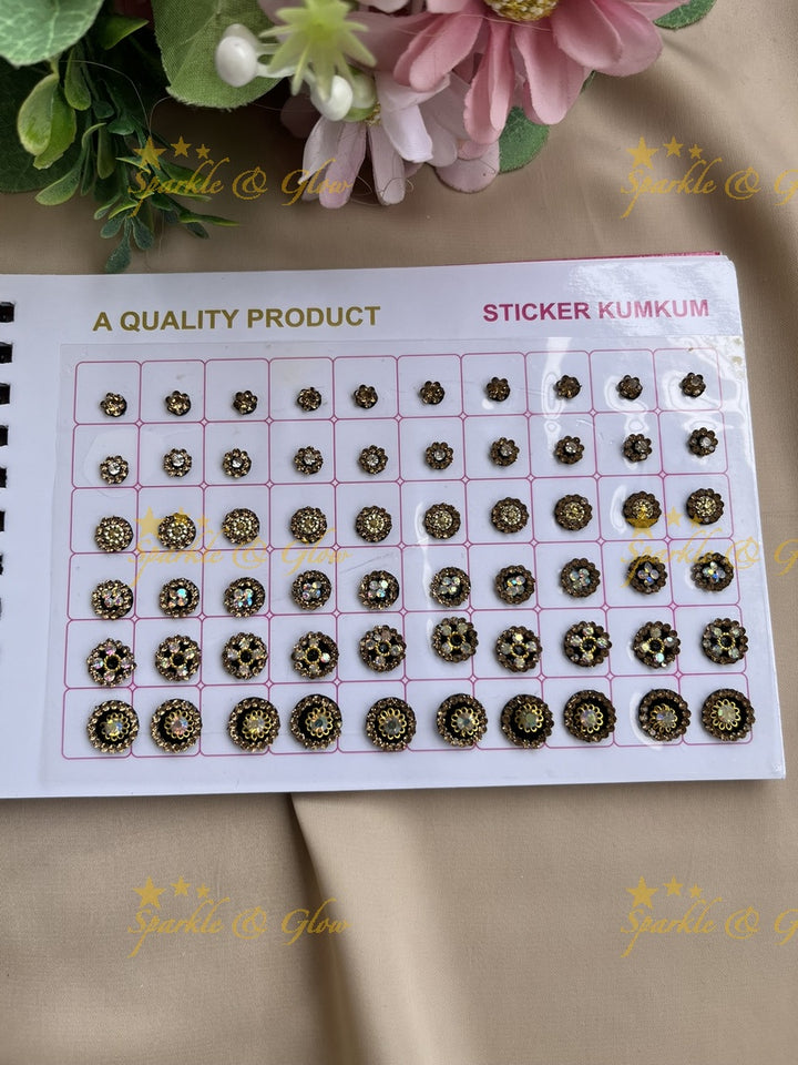 Navya round stone silver and gold design black bindi with different size in spiral book
