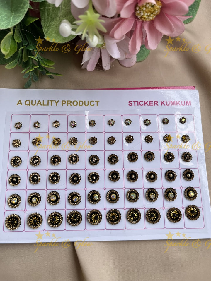 Navya round stone silver and gold design black bindi with different size in spiral book