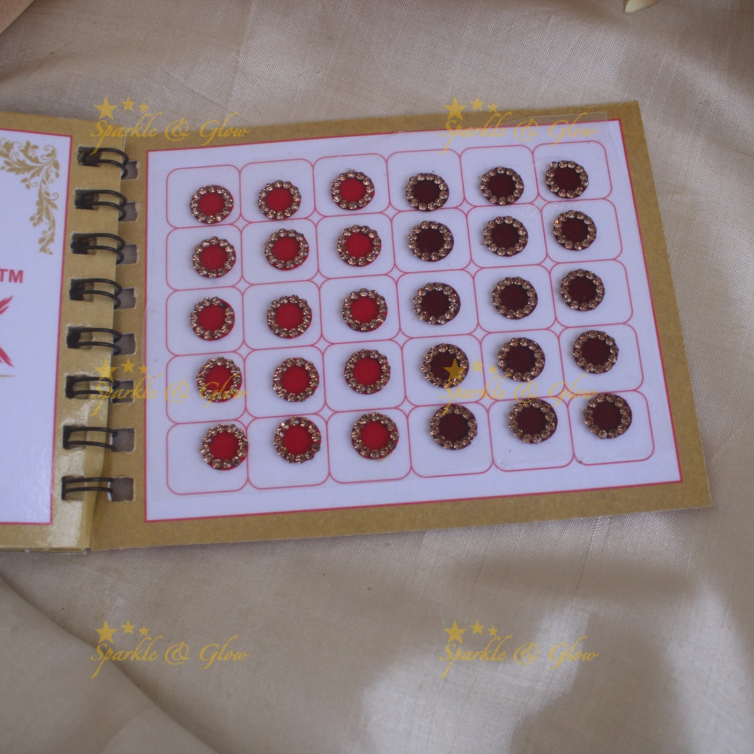 Swastik round stone silver and gold design bindi with single size in spiral book in assorted colours