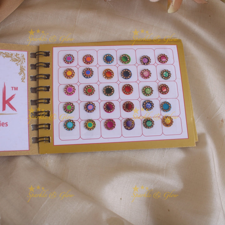 Swastik round stone 3D design and plain bindi with single size in spiral book in assorted colours - Sparkle and Glow