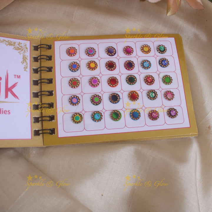 Swastik round stone 3D design and plain bindi with single size in spiral book in assorted colours - Sparkle and Glow