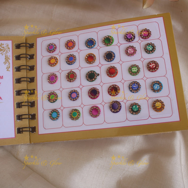 Swastik round stone 3D design and plain bindi with single size in spiral book in assorted colours - Sparkle and Glow