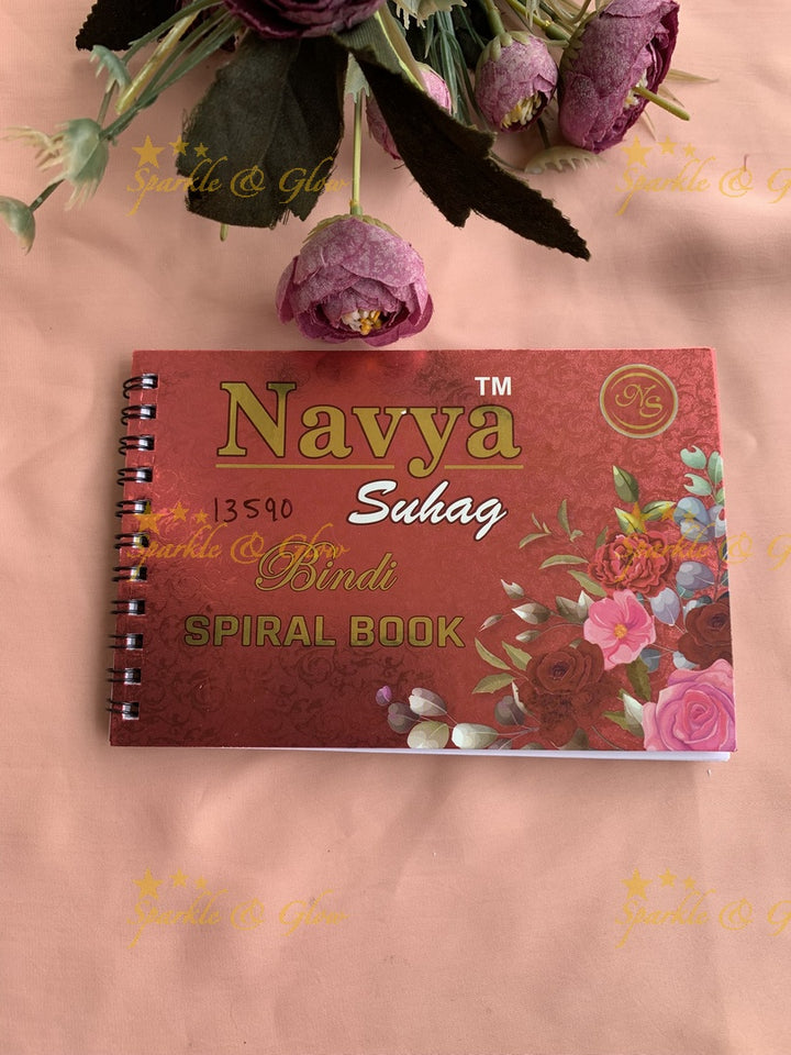 Navya stone and kundan bindi with different shape and size in spiral book in assorted colours