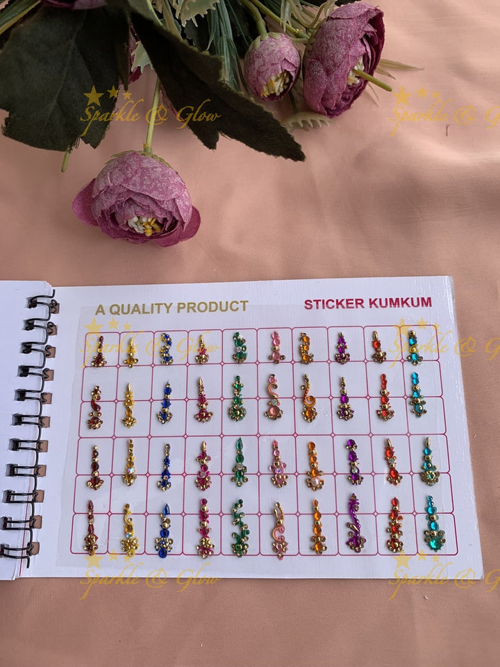 Navya stone and kundan bindi with different shape and size in spiral book in assorted colours