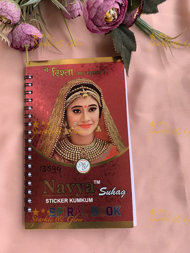Navya round black bindi with different size in spiral book