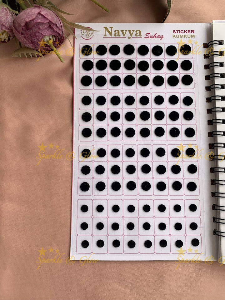 Navya round black bindi with different size in spiral book