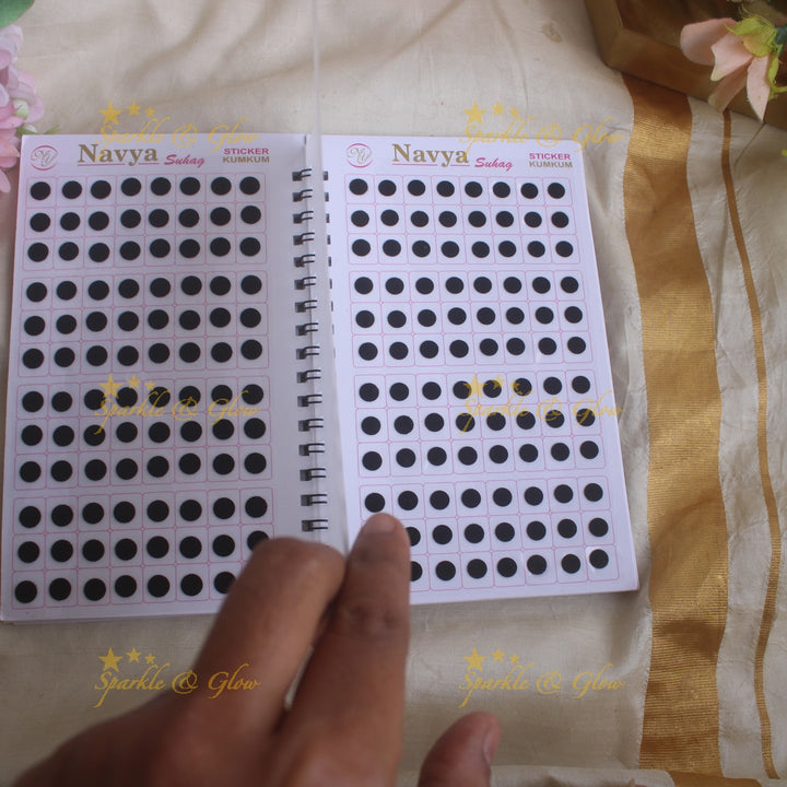 Navya round black bindi with different size in spiral book