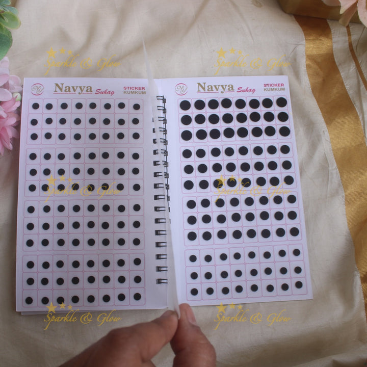 Navya round black bindi with different size in spiral book