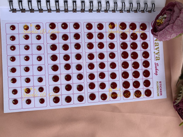 Navya single stone round bindi with different size in spiral book in assorted colours