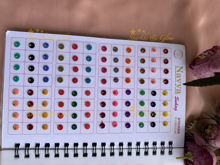 Navya single stone round bindi with different size in spiral book in assorted colours