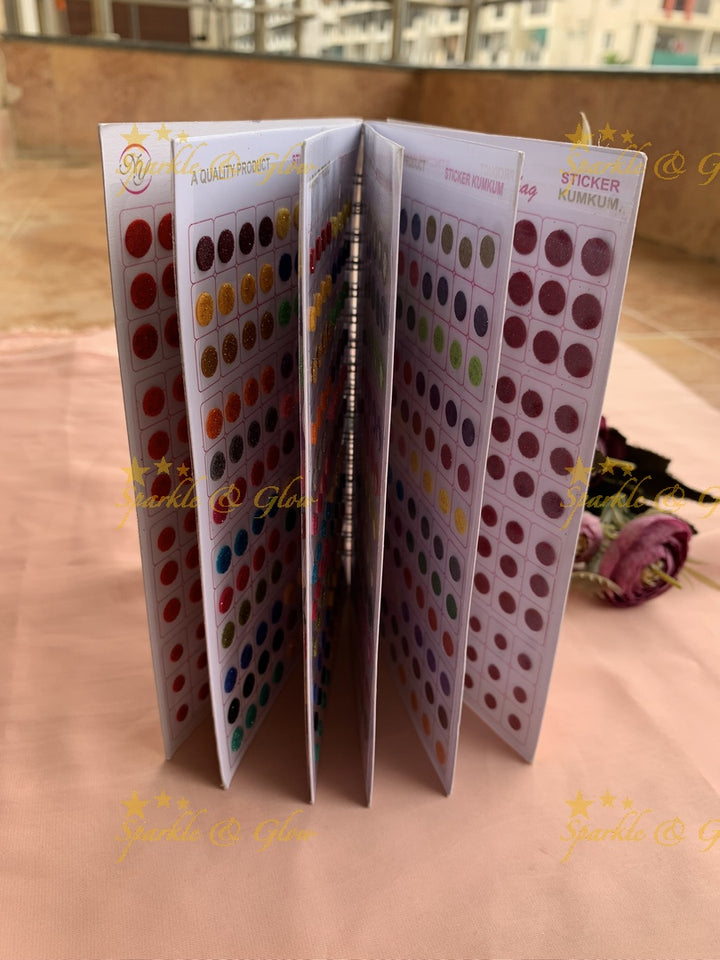 Navya round bindi with glitter with different size in spiral book in assorted colours