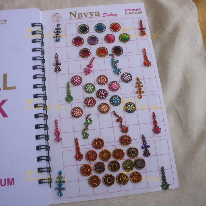 Navya stone silver and gold design bridal bindi with different shape and size in spiral book in assorted colours