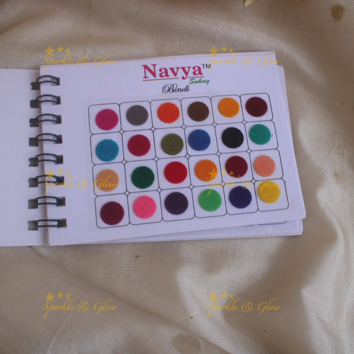 Navya round big bindi with plain glitter and 3D with in spiral book in assorted colours