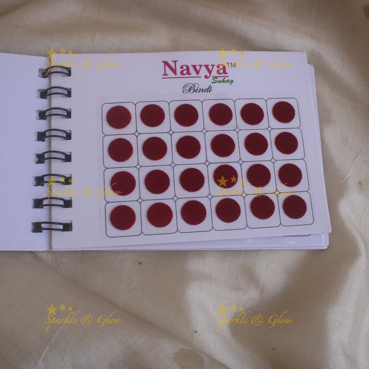 Navya round big bindi with plain glitter and 3D with in spiral book in assorted colours