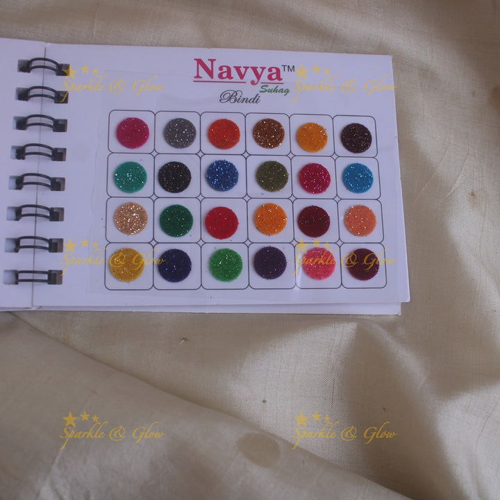 Navya round big bindi with plain glitter and 3D with in spiral book in assorted colours
