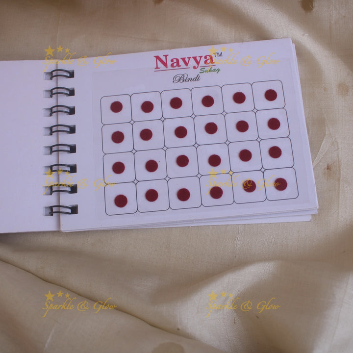 Navya round bindi with plain glitter and 3D with in spiral book in assorted colours - size 6