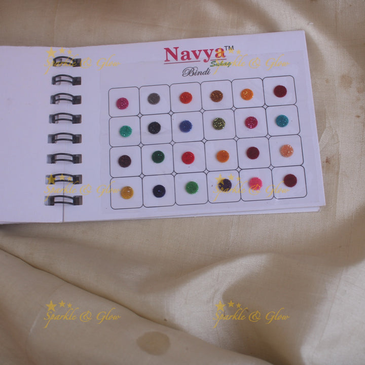 Navya round bindi with plain glitter and 3D with in spiral book in assorted colours - size 6