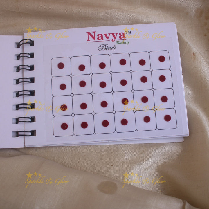 Navya round bindi with plain glitter and 3D with in spiral book in assorted colours - size 7