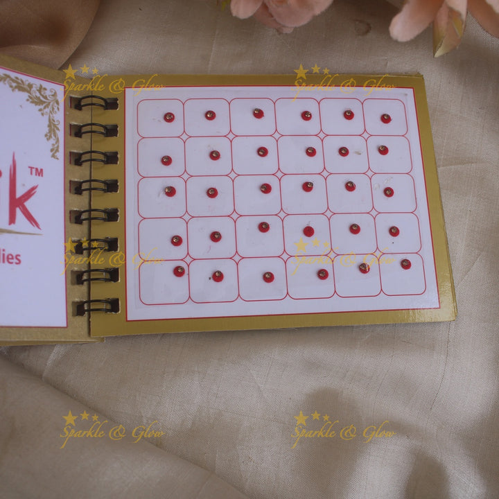Swastik round single stone bindi with in spiral book in assorted colours