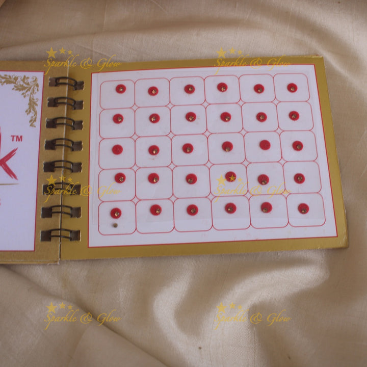 Swastik round single stone bindi with in spiral book in assorted colours - size 4