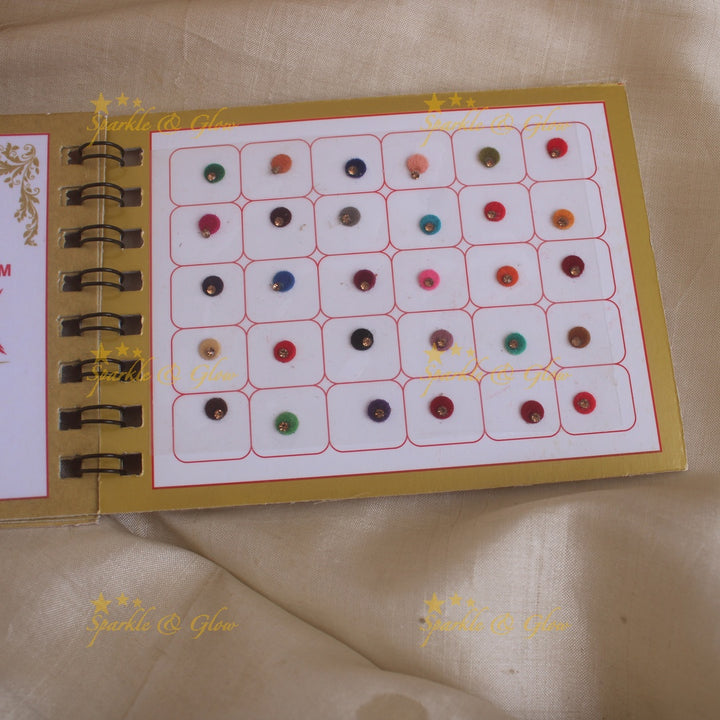 Swastik round single stone bindi with in spiral book in assorted colours - size 4