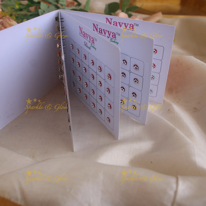 Navya round single size stone bindi with in spiral book in assorted colours