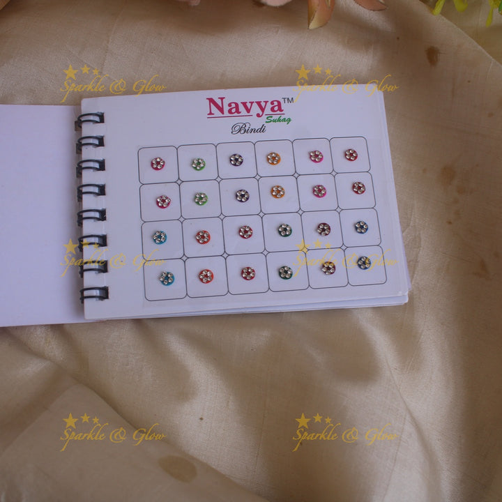 Navya round single size stone bindi with in spiral book in assorted colours