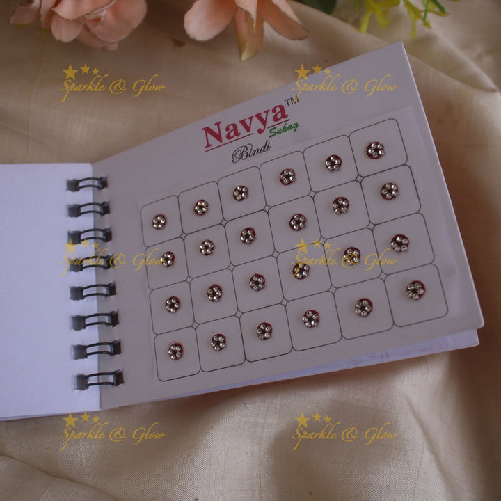 Navya round single size stone bindi with in spiral book in assorted colours