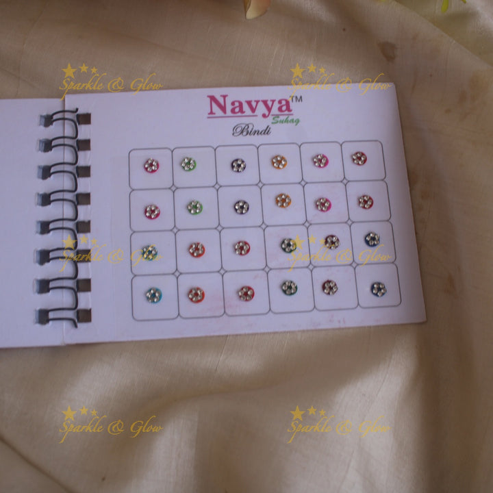 Navya round single size stone bindi with in spiral book in assorted colours