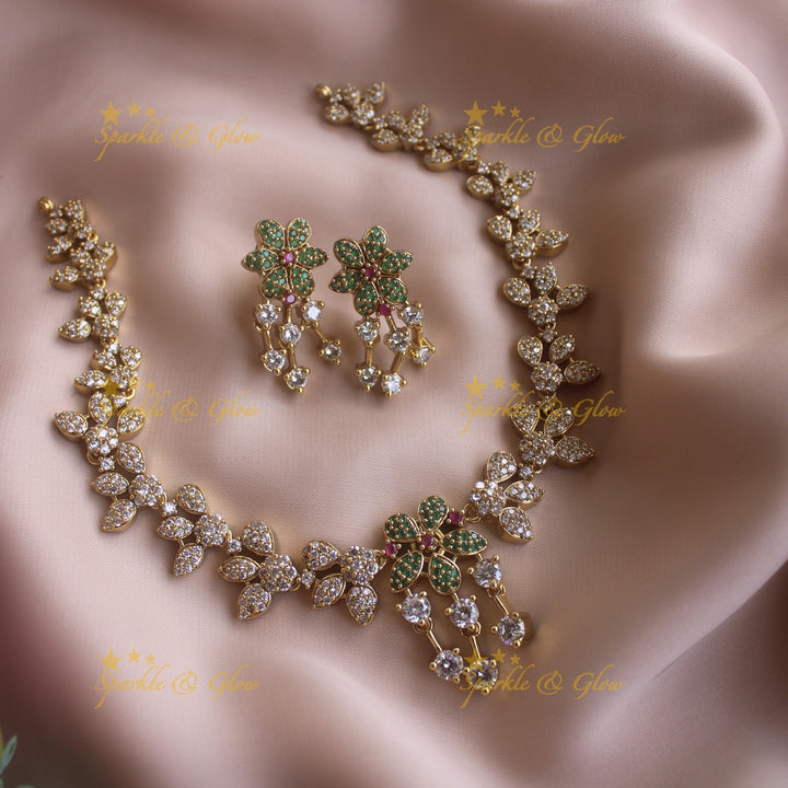 Stunning Floral and Leaflet design AD short necklace with emerald stones